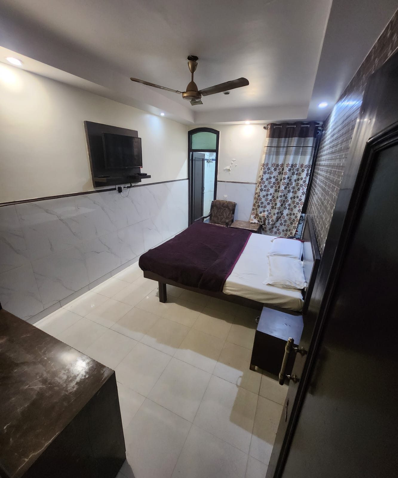 A Standard A/C Room at Hotel Uttam Heritage, made up and ready